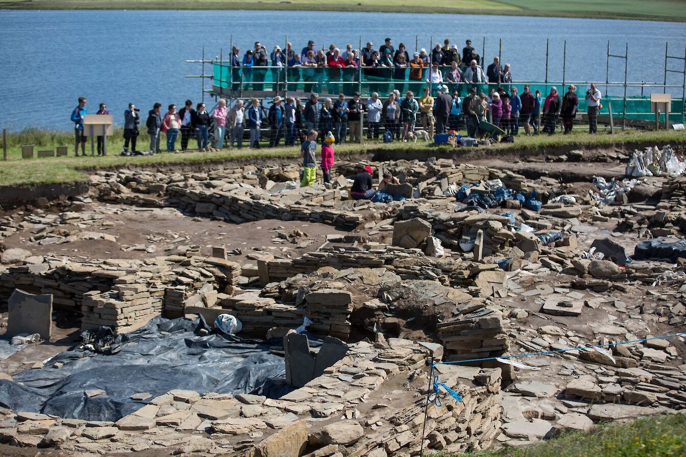 Tour group getting a bird's eye view of the site