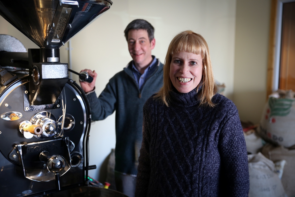 Euan Smith and Sara Tait from the Orkney Roastery, alongside their Toper roaster