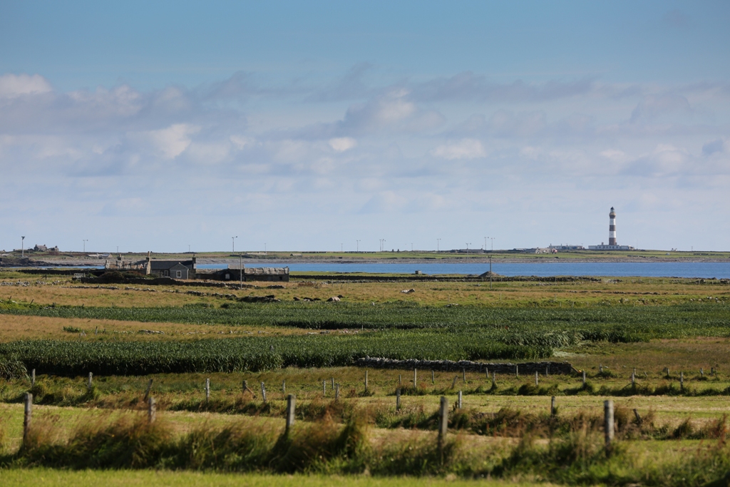 The view across North Ronaldsay to the island's lighthouse