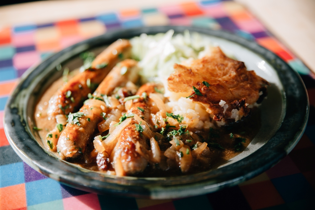 Rosemary's sausages with beer and onion gravy