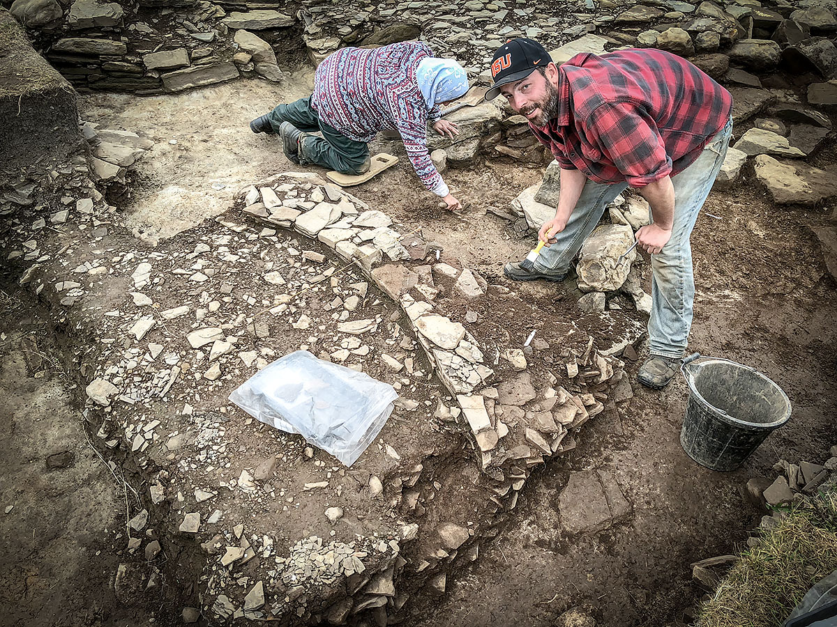 Rob investigating a later, ephemeral section of wailing at the bottom of Trecnch J and outside Structure Five