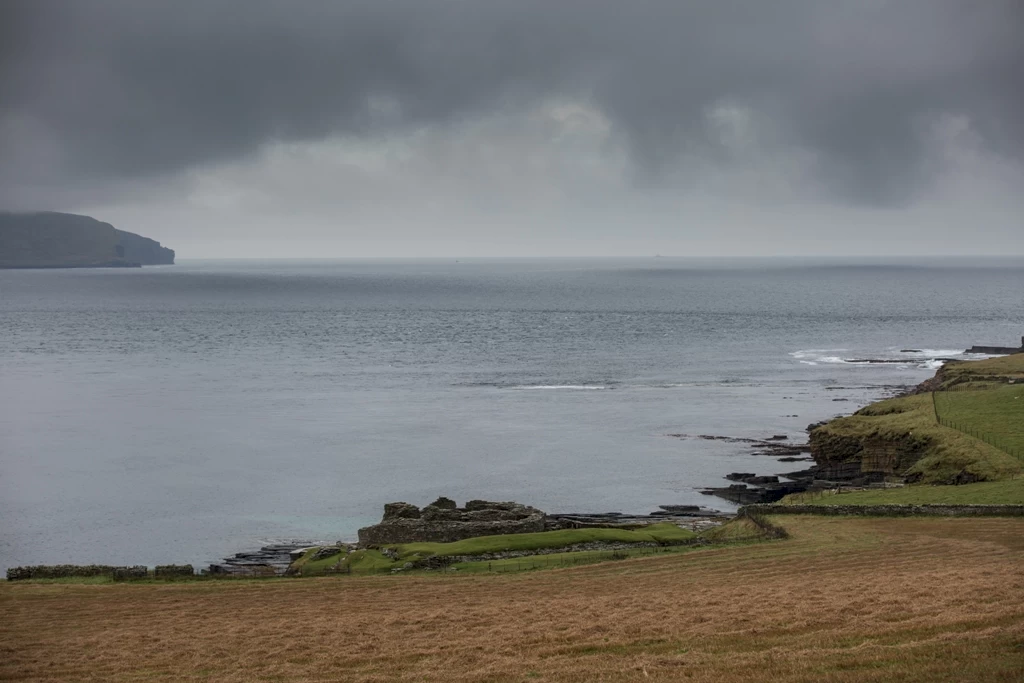 The broch is perched on the coast overlooking Eynhallow Sound