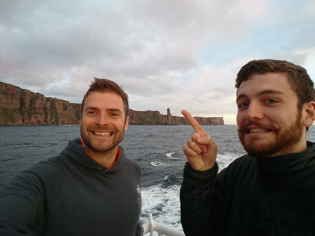 Pete Colledge and Alex Hale onboard the Hamnavoe, and their first sighting of the Old Man of Hoy - image by Pete Colledge