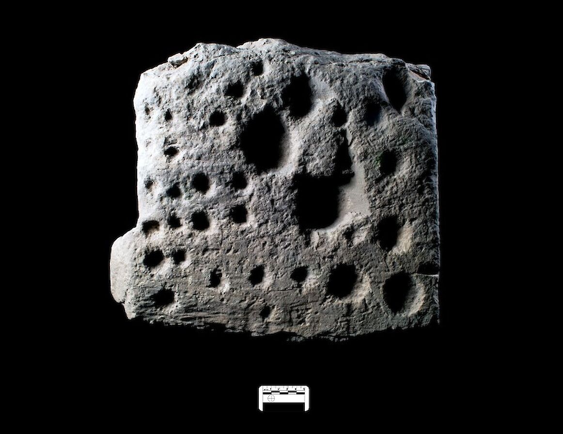 Multi cup-marked stone - image by Antonia Thomas