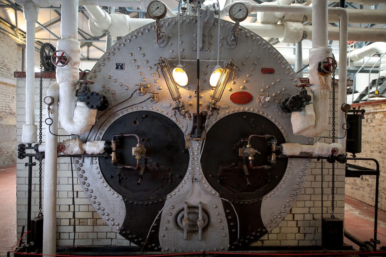 One of the boilers in the old pumphouse building