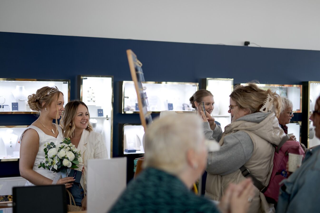 The official opening of the new shop was carried out by Leah Hamilton, this year's Stromness Shopping Week queen
