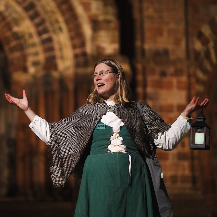 Dr Ragnhild Ljosland leading her Orkney Witchcraft Trials walk at St Magnus Cathedral, Kirkwall