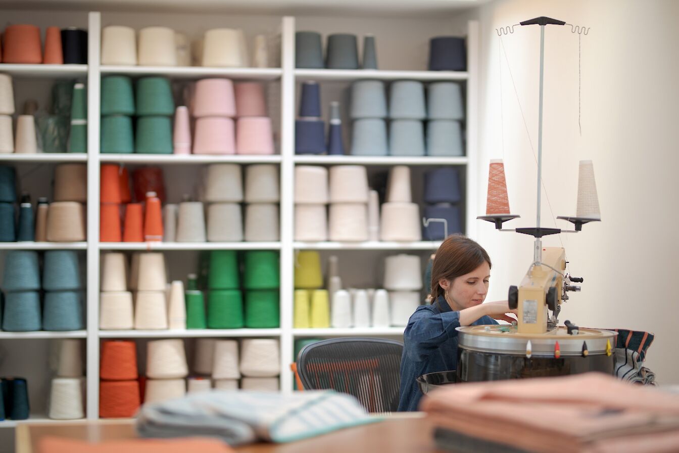 Hilary Grant at work on the linker machine.