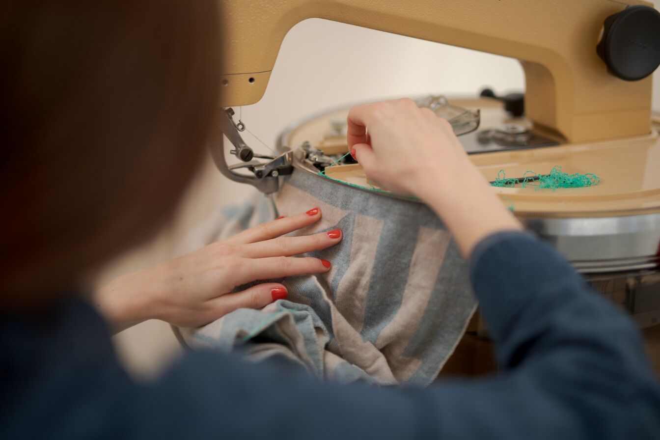 Hilary Grant at work on the linker machine.