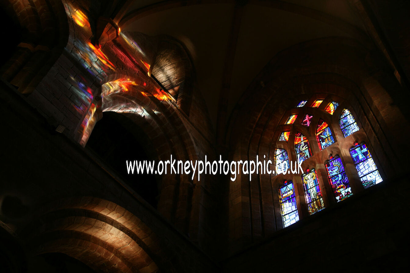 The summer light streaming through the west window of St Magnus Cathedral for more photographs click on www.orkneyphotographic.co.uk