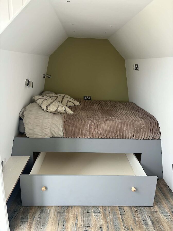 Storage area under bed